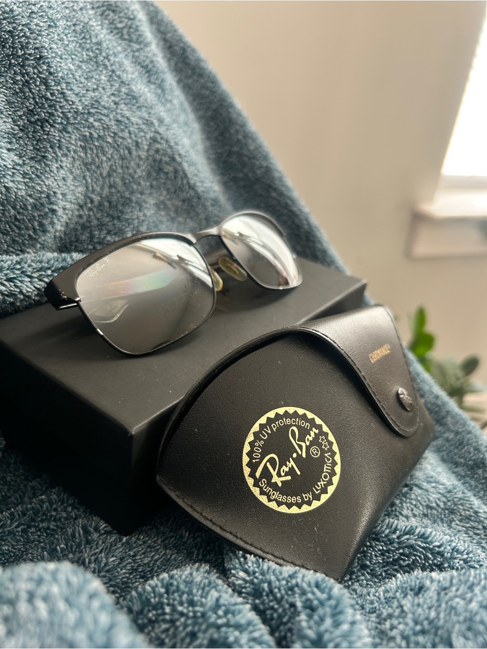 Ray-Ban Black Sunglasses with Silver Lenses